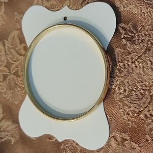 Classic Monet gold tone bangle bracelet.